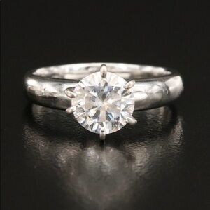 - Sterling silver CZ solitaire ring